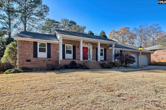 ranch-style home with a porch, a garage, and a front lawn