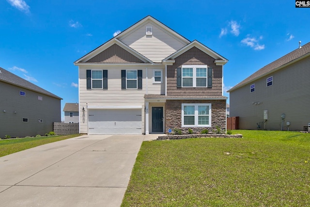 view of front of house with a garage and a front lawn