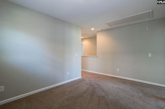 spare room featuring carpet floors