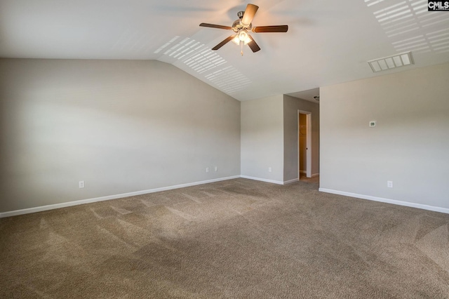 spare room with ceiling fan, carpet floors, and lofted ceiling