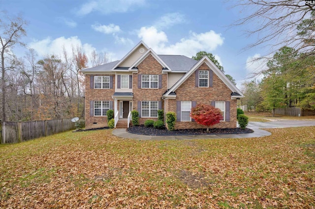 view of front of house featuring a front lawn