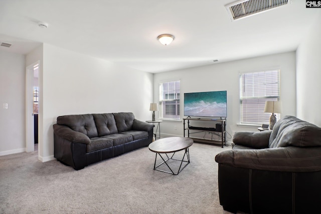 carpeted living room featuring a wealth of natural light