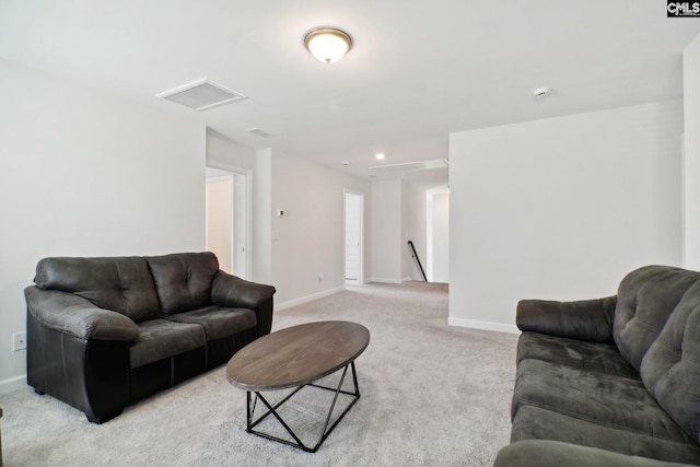 living room featuring light colored carpet