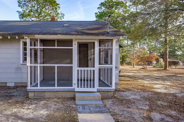 exterior space with a sunroom