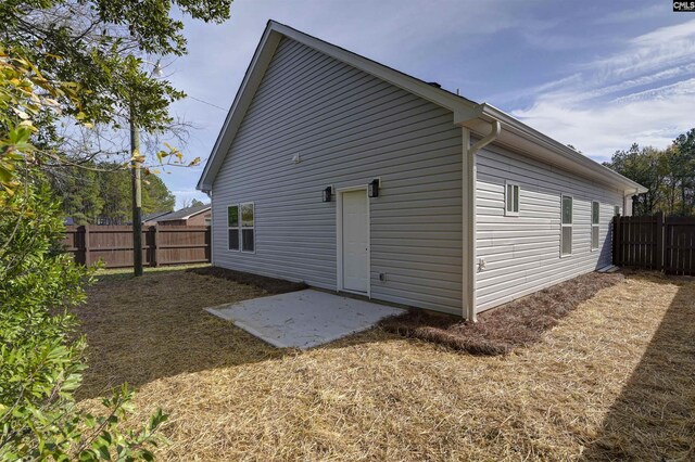 rear view of property with a patio