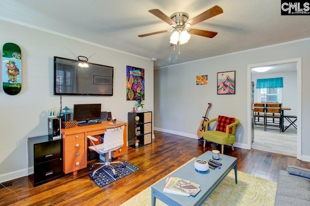 office featuring a textured ceiling, dark hardwood / wood-style flooring, ceiling fan, and ornamental molding