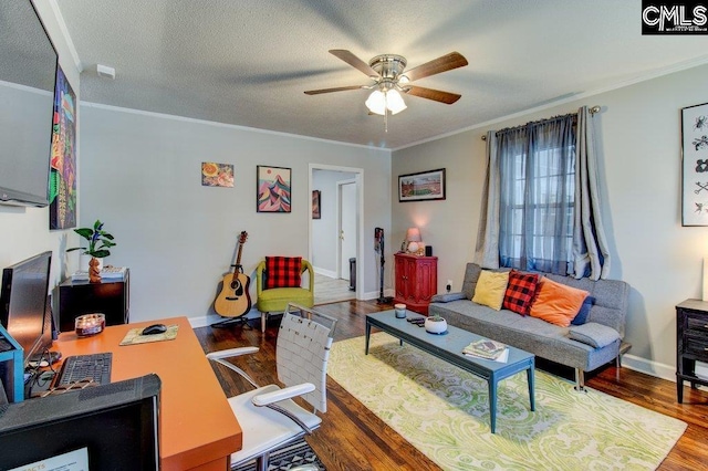 office space with hardwood / wood-style flooring, ceiling fan, crown molding, and a textured ceiling