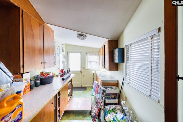 kitchen featuring lofted ceiling