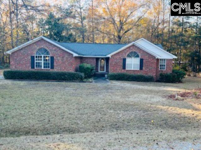 ranch-style house with a front yard