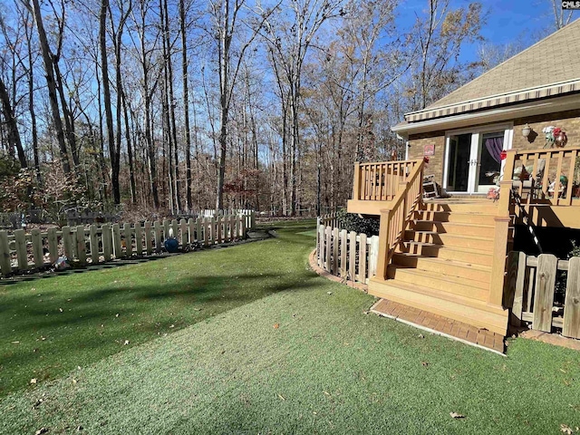 view of yard featuring a wooden deck