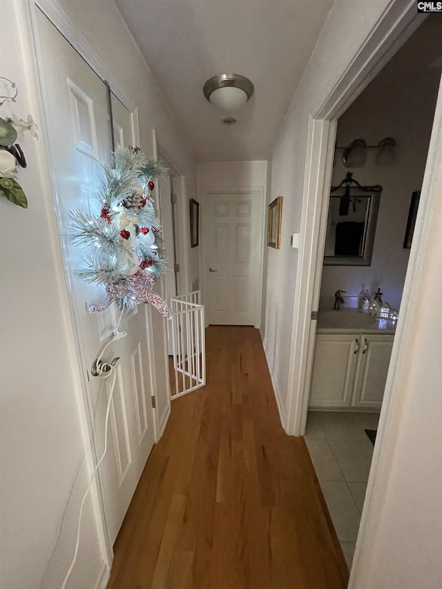 hallway featuring light wood-type flooring