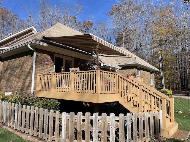 view of side of home featuring a deck