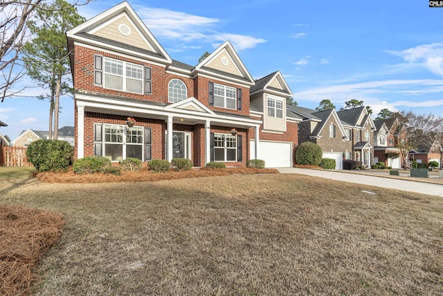 view of front of property with a front lawn and a garage