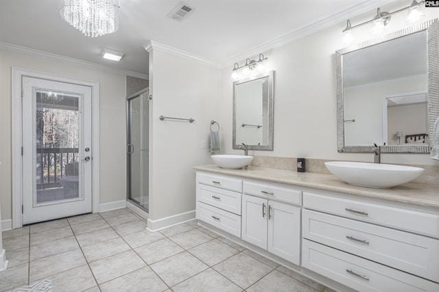 bathroom with vanity, tile patterned floors, and crown molding