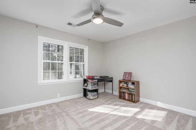 misc room with ceiling fan and light carpet