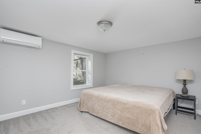 bedroom featuring carpet floors and a wall mounted AC