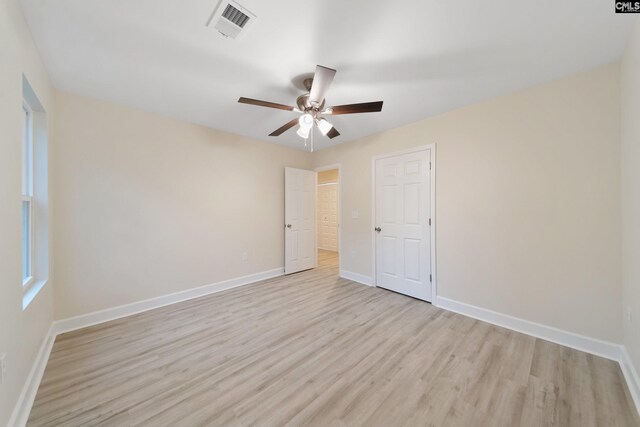 1758 Baughman Rd, Lugoff, SC 29078 - empty room with light wood-style flooring and ceiling fan