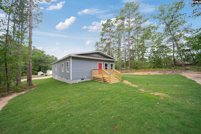 1758 Baughman Rd, Lugoff, SC 29078 - rear view of house with crawl space and a yard