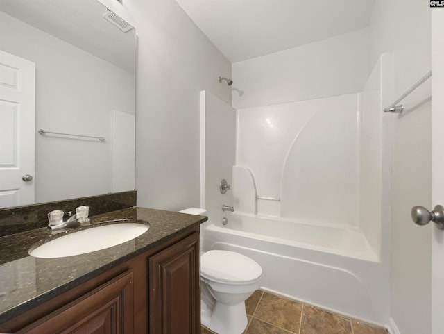 full bathroom featuring bathtub / shower combination, tile patterned floors, vanity, and toilet