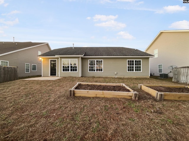 back of house with cooling unit and a patio area