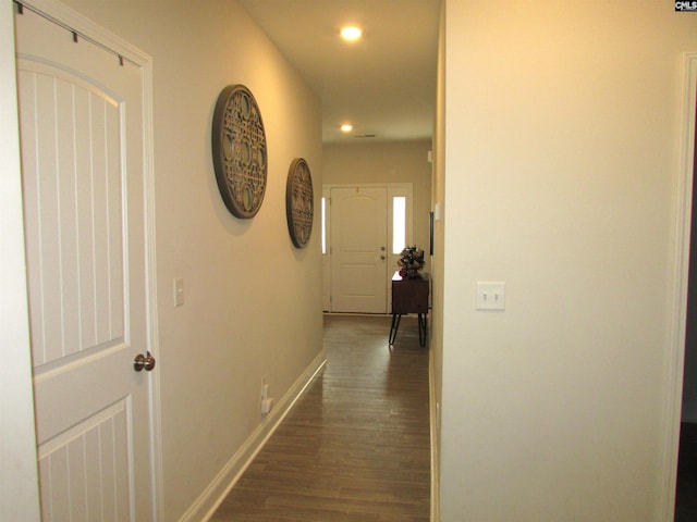 hall featuring dark wood-type flooring