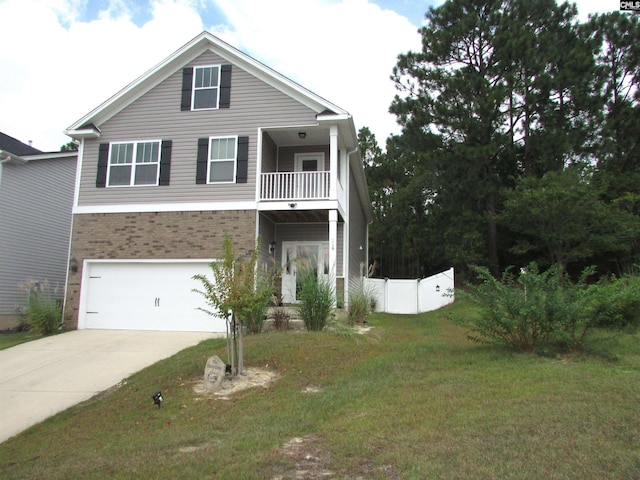 view of front of property featuring a balcony, a garage, and a front lawn