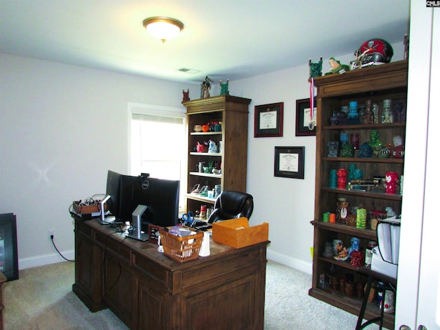 home office featuring light colored carpet