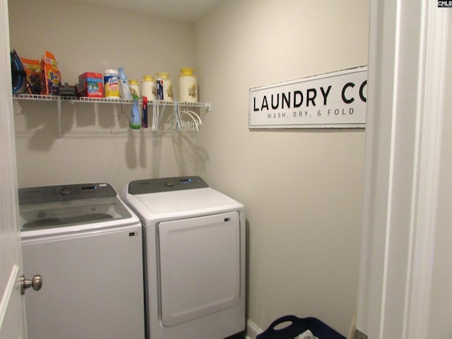 washroom with washer and clothes dryer