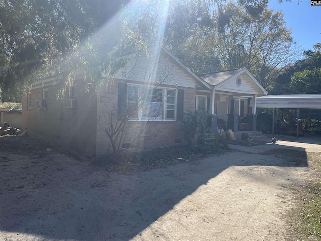 view of front of house with a carport