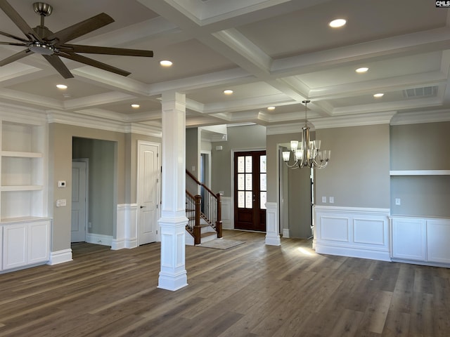 empty room with coffered ceiling, ceiling fan with notable chandelier, ornamental molding, beam ceiling, and dark hardwood / wood-style flooring