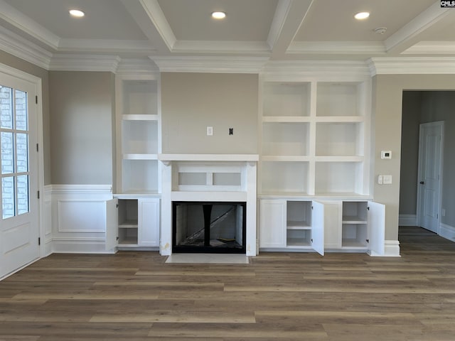 unfurnished living room with dark hardwood / wood-style flooring and ornamental molding