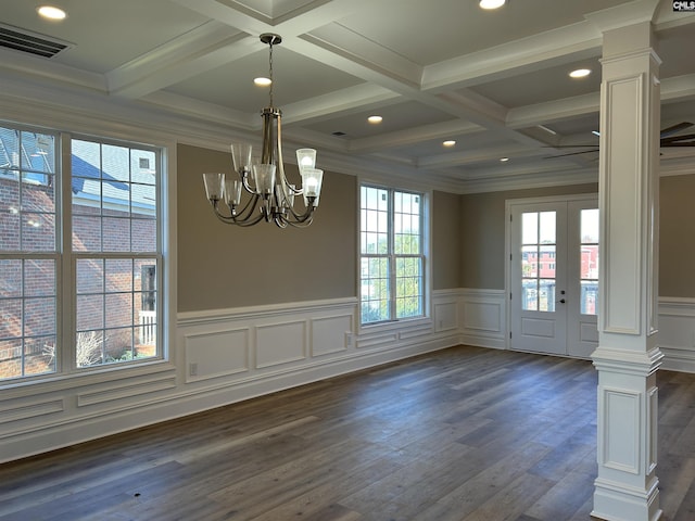 unfurnished dining area featuring a chandelier, beam ceiling, dark hardwood / wood-style flooring, and coffered ceiling