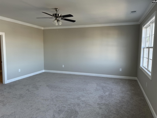 unfurnished room featuring crown molding, carpet, and ceiling fan