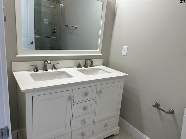 bathroom with vanity and walk in shower