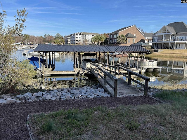 view of dock with a water view