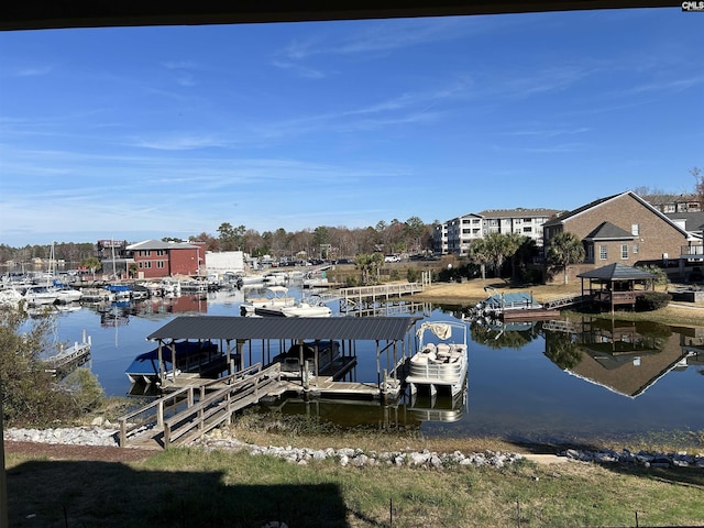 dock area with a water view