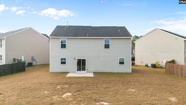 back of house featuring central AC and a patio area