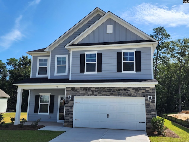 craftsman house with a garage