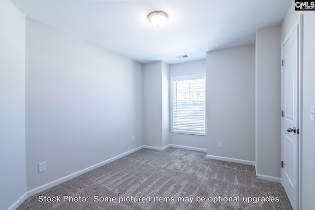 view of carpeted spare room