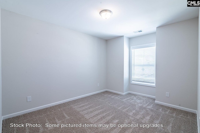 empty room featuring carpet flooring