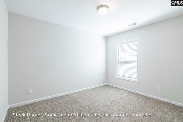 empty room featuring carpet flooring