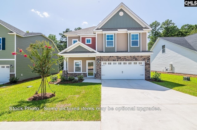 craftsman house with a garage and a front yard