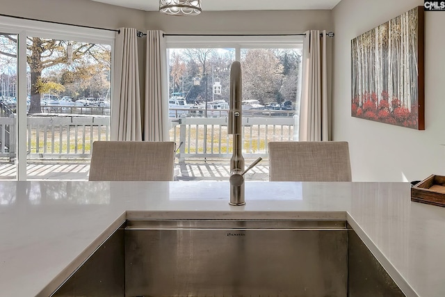 unfurnished dining area with sink