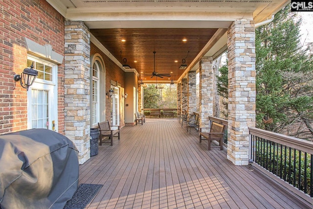 deck featuring ceiling fan and grilling area