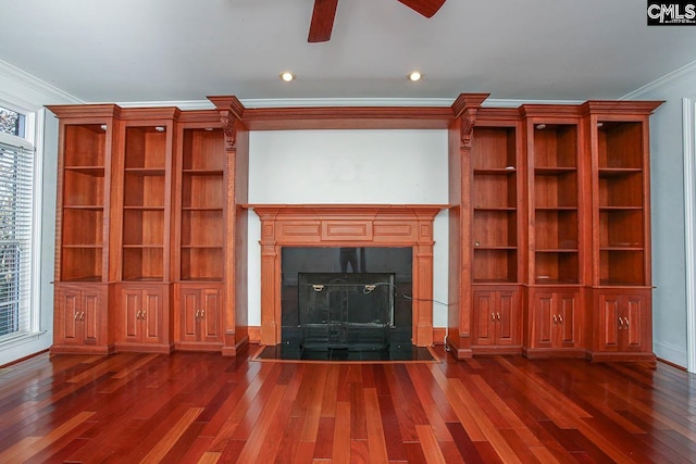 unfurnished living room with ceiling fan, dark hardwood / wood-style flooring, and crown molding