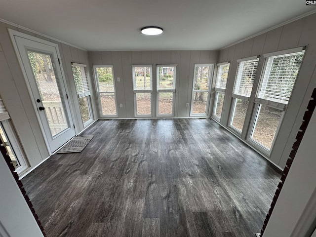 unfurnished sunroom with a wealth of natural light