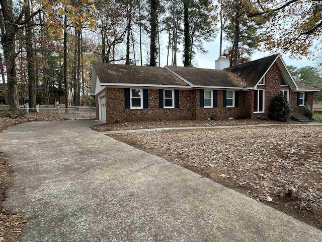 single story home with a garage