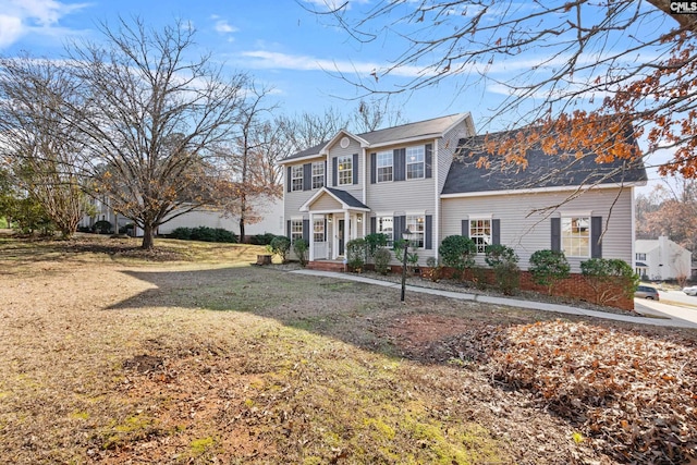 view of front of home featuring a front yard