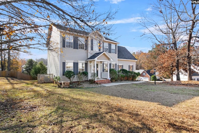 view of front of home featuring a front yard