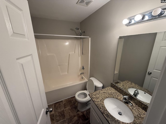 full bathroom with bathing tub / shower combination, vanity, and toilet